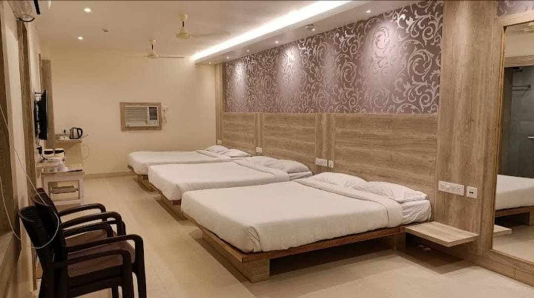 Family Room at Shri Gajanan Maharaj Sansthan — Spacious room perfect for families